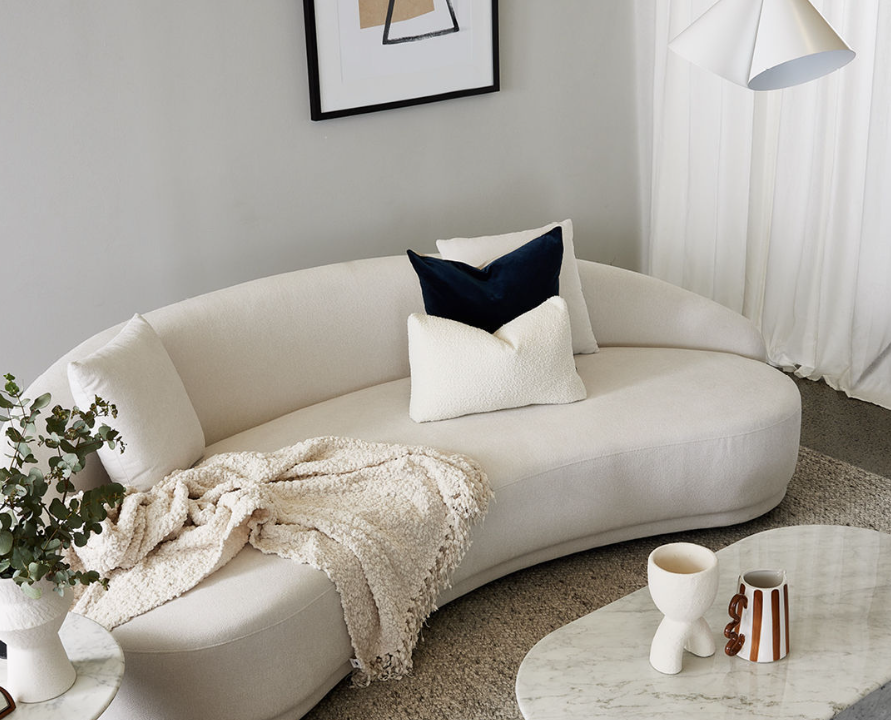 From Minimalist to Eclectic: How to Style the Wall Behind Your Sofa to Match Your Décor